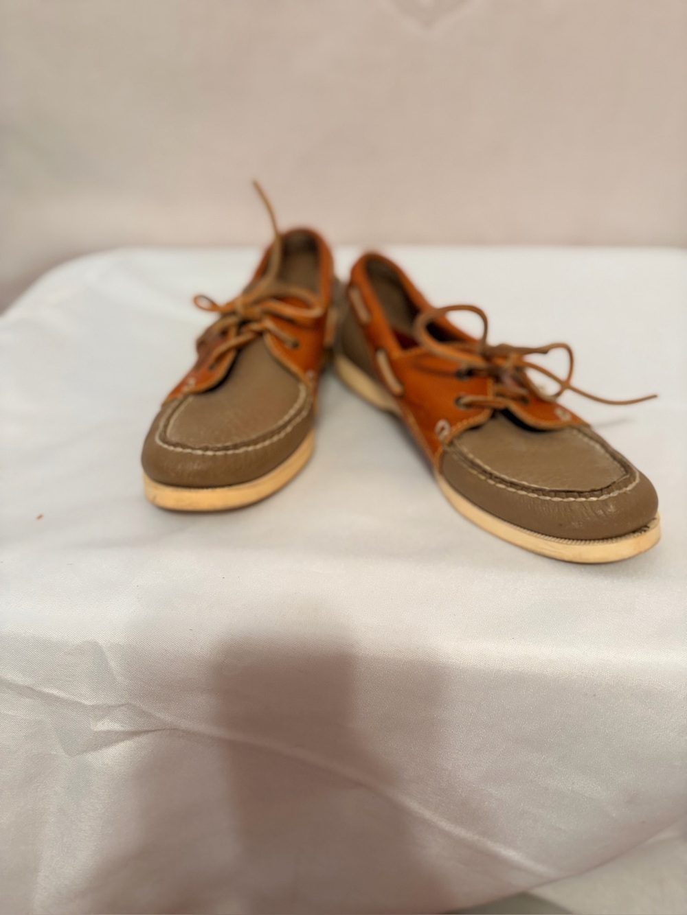 Dooney & Bourke Regatta pebbled leather boat shoes in a two-tone taupe and brown